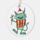 Kerstmonster met cadeau keramisch ornament (Links)