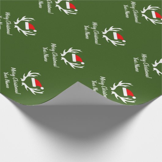 Kerstmuts en  rendieren gewei kerst cadeaupapier (Hoek)