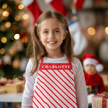 kerstnaam snoepriet schort<br><div class="desc">Met een feestelijk snoeprietgestreept schort kunt u Kerstmis vieren. Pas het aan met de naam of helder. De rode band is ook editable.</div>