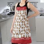 Kerstontbijt Schort<br><div class="desc">Dit schattige kerstbakkerij schort is voorzien van een koekjespatroon dat voorzien is van blauwe sneeuwvlokken. De tekst van de douane staat u toe om zich te personaliseren.</div>