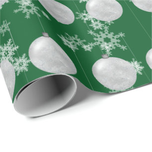 Kerstornament en sneeuwvlokken inpakpapier