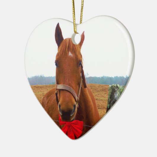 Kerstpaard met rode boog keramisch ornament (Links)