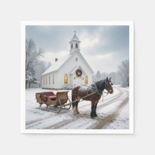 Kerstpaard met slee wachtend bij een kapel servet