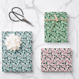 Kerstpapier vellen met vrolijke hulst afbeeldingen
