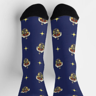 Kerstpatroon met een lantaarn op een blauwe achter sokken
