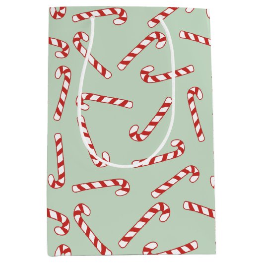 Kerstpatroon met rode, groene en witte snoepriet medium cadeauzakje (Voorkant)