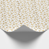 Kerstpatroon van hulstbladeren. Goud op wit Cadeaupapier (Hoek)
