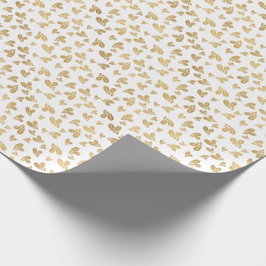 Kerstpatroon van hulstbladeren. Goud op wit Cadeaupapier (Hoek)