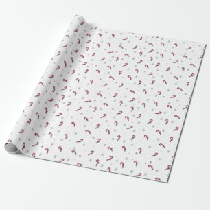 Kerstpatroon van lolly's en sneeuwvlokken cadeaupapier