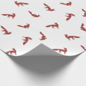Kerstpatroon van rode vossen op wintersneeuw cadeaupapier (Hoek)