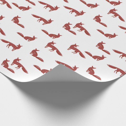 Kerstpatroon van rode vossen op wit cadeaupapier (Hoek)