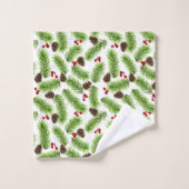 Kerstpijnboombladeren, kegels en bessen op wit bad handdoek (Wasdoekje)