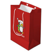 Kerstpinguïn die over sneeuw loopt medium cadeauzakje (Voorkant Gekanteld)