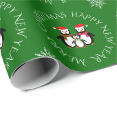 kerstpinguïn familie aangepaste tekst groen cadeaupapier (Rol Hoek)