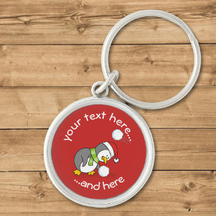 Kerstpinguïn Krijgt Een Sneeuwbal Sleutelhanger