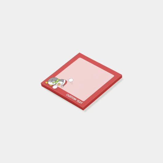 Kerstpinguïn krijgt sneeuwbal post-it® notes (Schuin)