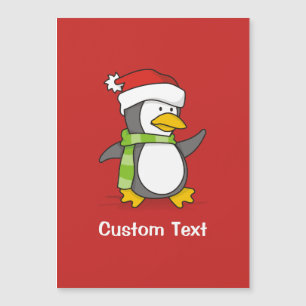 Kerstpinguïn loopt op sneeuw