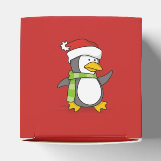 Kerstpinguïn loopt op sneeuw bedankdoosjes (Bovenkant)