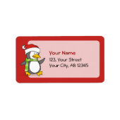 Kerstpinguïn loopt op sneeuw etiket (Voorkant)