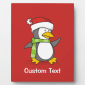 Kerstpinguïn loopt op sneeuw fotoplaat (Voorkant)