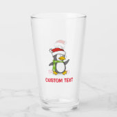 Kerstpinguïn loopt op sneeuw glas (Achterkant)