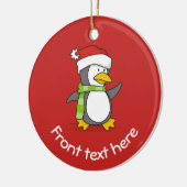 Kerstpinguïn loopt op sneeuw keramisch ornament (Links)