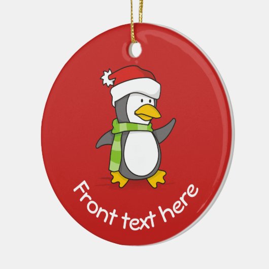 Kerstpinguïn loopt op sneeuw keramisch ornament (Links)