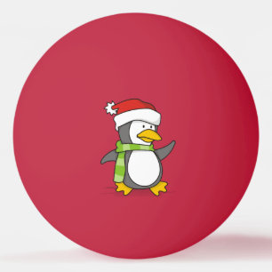 Kerstpinguïn loopt op sneeuw pingpongbal