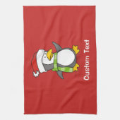 Kerstpinguïn loopt op sneeuw theedoek (Verticaal)