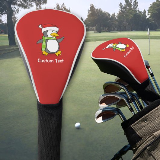Kerstpinguïn lopend op sneeuw golfheadcover