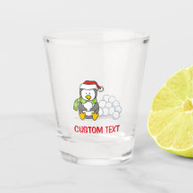 Kerstpinguïn met sneeuwballen