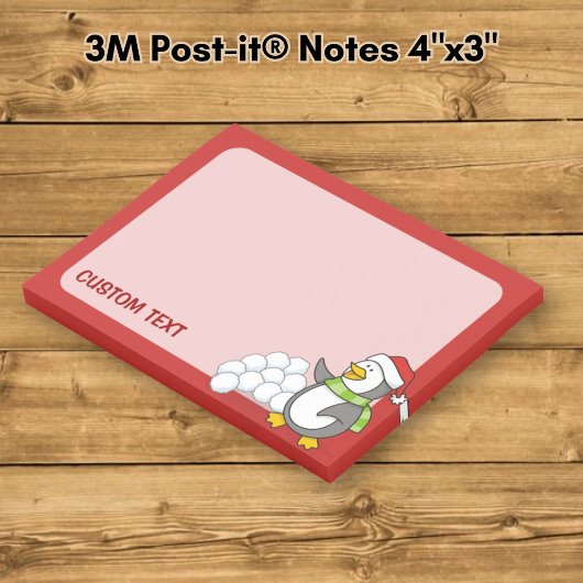 Kerstpinguïn met sneeuwballen zwaaiend post-it® notes