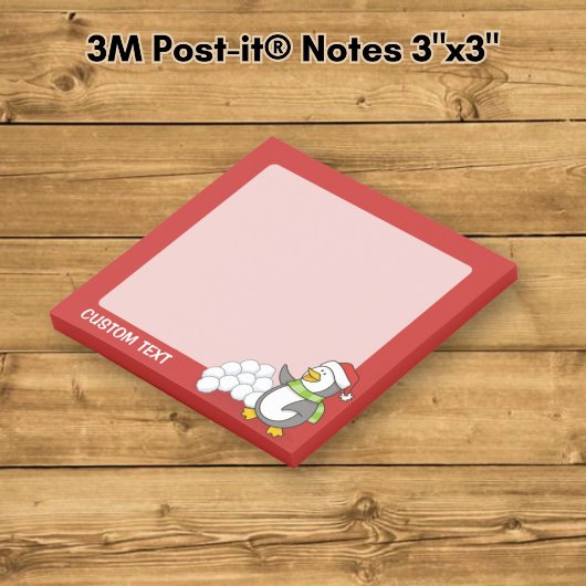 Kerstpinguïn met sneeuwballen zwaaiend post-it® notes