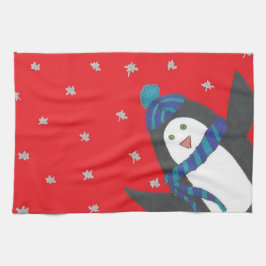 Kerstpinguïn op rood theedoek