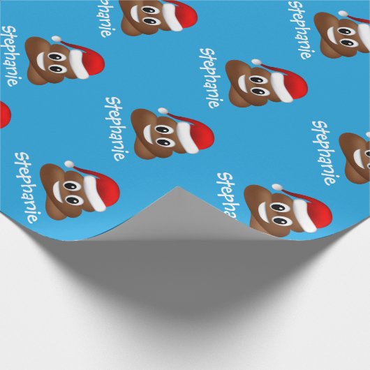 Kerstpoep emoji met kerstmuts inpakpapier (Hoek)