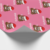 Kerstpoep emoji met kerstmuts inpakpapier (Hoek)