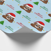 Kerstpoep emoji met kerstmuts inpakpapier (Hoek)