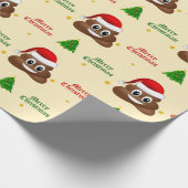 Kerstpoep emoji met kerstmuts inpakpapier (Hoek)