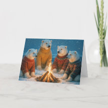 Kerstpoolberen rond een vreugdevuur