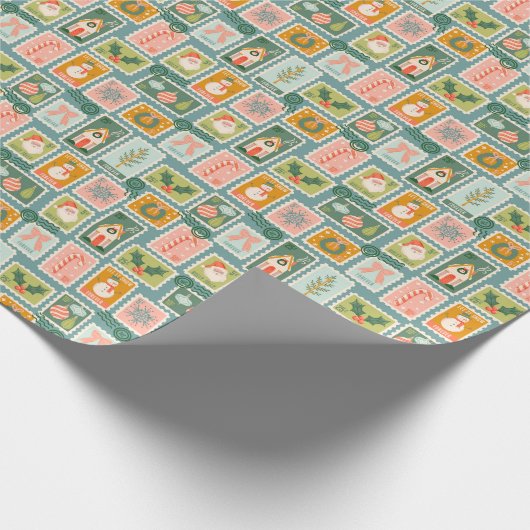 Kerstpostzegels op blauw cadeaupapier (Hoek)