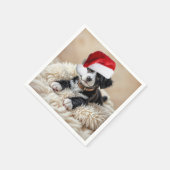 Kerstpuppy op een bontkussen servet (Hoek)