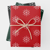 Kerstrode donkergroene zwarte witte sneeuwvlokken inpakpapier vel (In situ)