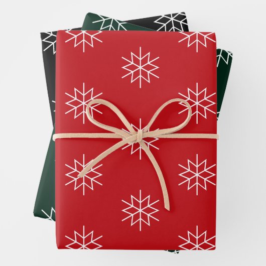 Kerstrode donkergroene zwarte witte sneeuwvlokken inpakpapier vel (In situ)