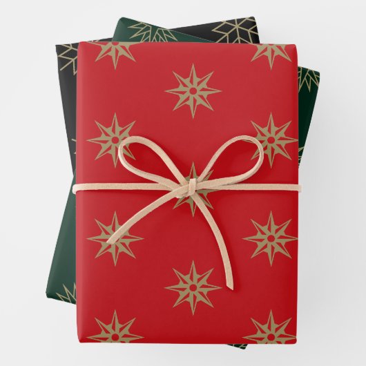 Kerstrode groene sneeuwvlokken, zwarte en gouden s inpakpapier vel (In situ)