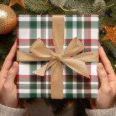 Kerstrood en groen geplakt inpakpapier vel