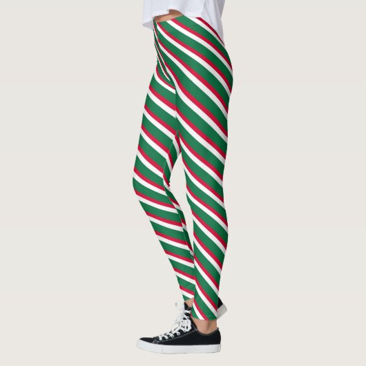Kerstrood en groen gestreept leggings (Links)