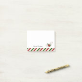 Kerstrood en groen post-it® notes (Op bureau)