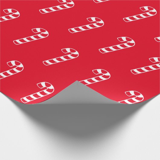 Kerstrood en wit patroon van snoepsnoeren cadeaupapier (Hoek)