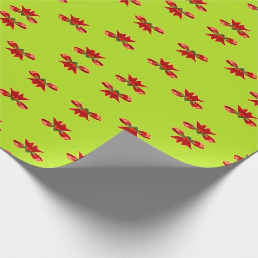 Kerstrood lint op felgroen cadeaupapier (Hoek)