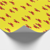 Kerstrood lint op geel cadeaupapier (Hoek)